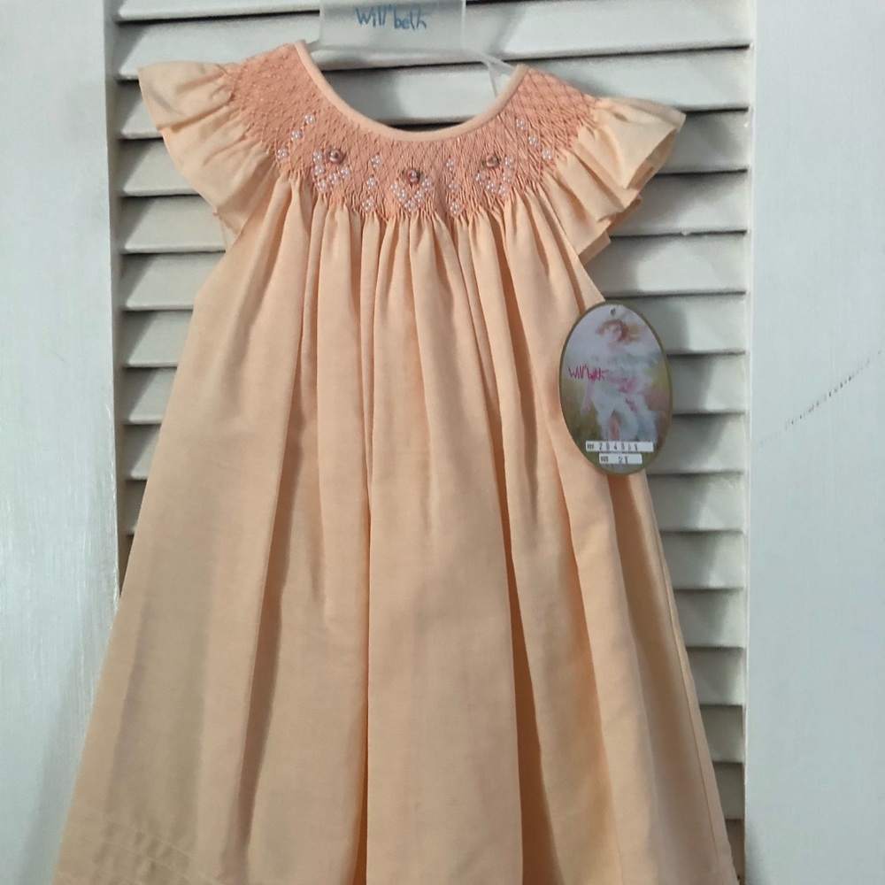 Peach smocked dress